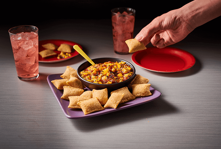 Quick Mango Salsa Sauce Dip & Pizza Rolls™ Recipe | Totino's™